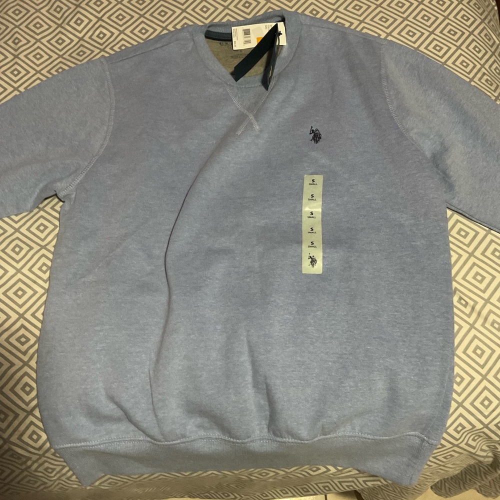 This is a jacket from U.S. POLO ASSN. Size small and color blue.